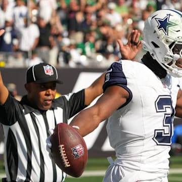 Dallas Cowboys wide receiver George Pickens reacts after a touchdown against the New York Jets at MetLife Stadium