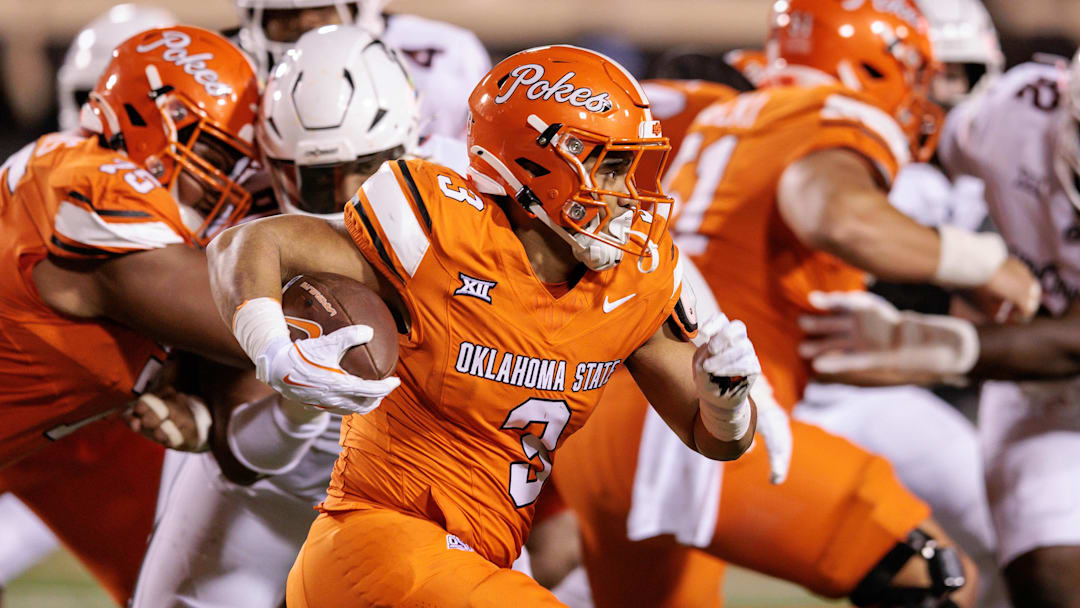 Oct 18, 2025; Stillwater, Oklahoma, USA; Oklahoma State Cowboys running back Sesi Vailahi (3) runs the ball during the second half against the Cincinnati Bearcats at Boone Pickens Stadium. Mandatory Credit: William Purnell-Imagn Images
