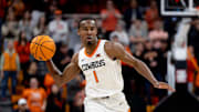 Jan 6, 2024; Stillwater, Okla, USA; Oklahoma State Cowboys guard Bryce Thompson (1) passes the ball in overtime of an NCAA men  s basketball game against the Baylor Bears at Gallagher-Iba arena. Mandatory Credit: Mitch Alcala-The Oklahoman