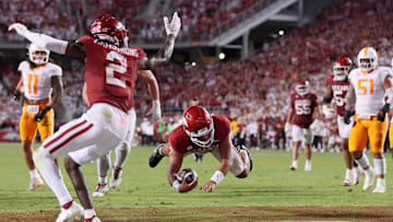 Oct 5, 2024; Fayetteville, Arkansas, USA; Arkansas Razorbacks quarterback Malachi Singleton (3) rushes for touchdown in the fourth quarter against the Tennessee Volunteers at Donald W. Reynolds Razorback Stadium. Arkansas won 19-14. Mandatory Credit: Nelson Chenault-Imagn Images