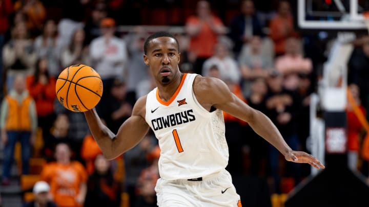 Jan 6, 2024; Stillwater, Okla, USA; Oklahoma State Cowboys guard Bryce Thompson (1) passes the ball in overtime of an NCAA men  s basketball game against the Baylor Bears at Gallagher-Iba arena. Mandatory Credit: Mitch Alcala-The Oklahoman