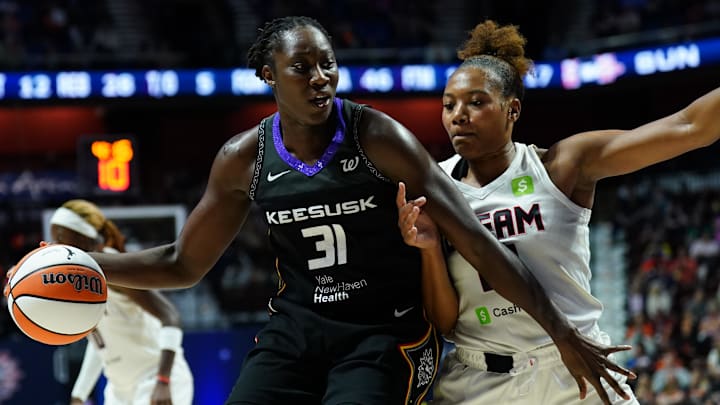 Connecticut Sun center Tina Charles (31) moves the ball against Atlanta Dream forward Naz Hillmon (0) in the second half at Mohegan Sun Arena. Connecticut Sun center Tina Charles (31) moves the ball against Atlanta Dream forward Naz Hillmon (0) in the second half at Mohegan Sun Arena.