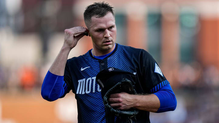 Detroit Tigers pitcher Tarik Skubal (29) checks his ear piece during the fourth inning against L. A. Dodgers at Comerica Park in Detroit on Friday, July 12, 2024.