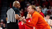 Jan 30, 2025; Lincoln, Nebraska, USA; Illinois Fighting Illini head coach Brad Underwood reacts after a call during overtime against the Nebraska Cornhuskers at Pinnacle Bank Arena. Mandatory Credit: Dylan Widger-Imagn Images