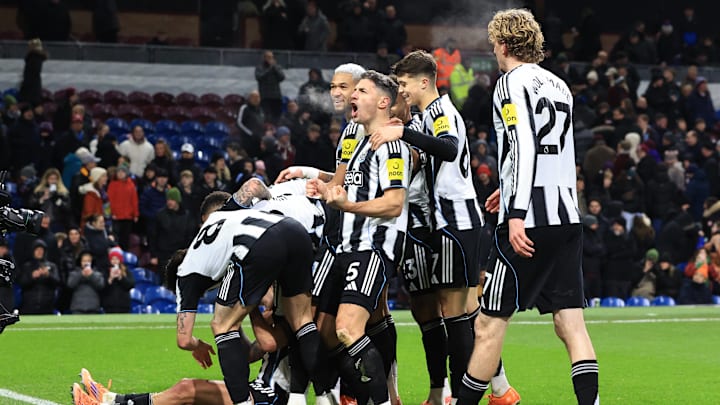 Newcastle players celebrate after Bruno Guimaraes scores for 1-3 in added time. Newcastle players celebrate after Bruno Guimaraes scores for 1-3 in added time.