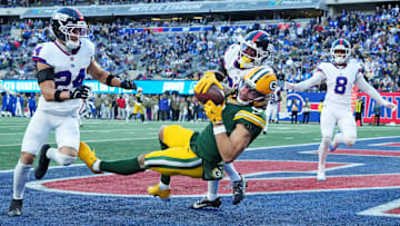 Nov 16, 2025; East Rutherford, New Jersey, USA; Green Bay Packers wide receiver Christian Watson (9) makes a touchdown catch against New York Giants cornerback Korie Black (38) during the fourth quarter during the fourth quarter at MetLife Stadium.  