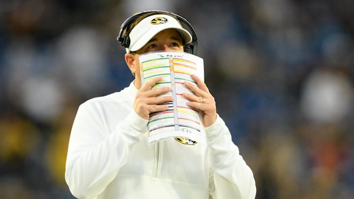 Dec 30, 2024; Nashville, TN, USA;  Missouri Tigers head coach Eliah Drinkwitz watches the clock against the Iowa Hawkeyes during the second half at Nissan Stadium. Mandatory Credit: Steve Roberts-Imagn Images
