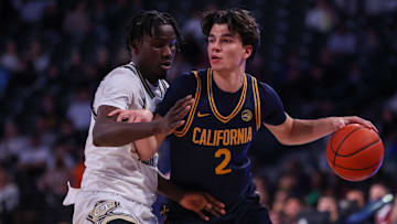 Feb 15, 2025; Atlanta, Georgia, USA; California Golden Bears guard Andrej Stojakovic (2) is defended by Georgia Tech Yellow Jackets forward Baye Ndongo (11) in the first half at McCamish Pavilion. Mandatory Credit: Brett Davis-Imagn Images
