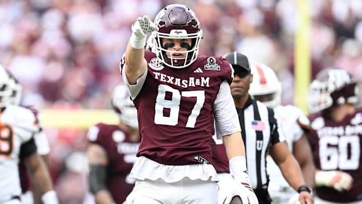Dec 20, 2025; College Station, TX, USA; Texas A&M Aggies tight end Nate Boerkircher (87) celebrates a first down against the Miami Hurricanes during first quarter of the first round game of the CFP National Playoff at Kyle Field. Mandatory Credit: Maria Lysaker-Imagn Images