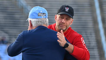 UNC football head coach Mack Brown and NC State football's Dave Doeren