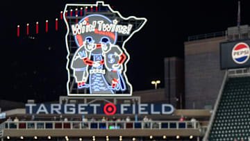 Sep 26, 2024; Minneapolis, Minnesota, USA; Miami Marlins infield Javier Sanoja (86) and the team regroups after Minnesota Twins outfielder Trevor Larnach (9) singles in the eleventh inning at Target Field. 