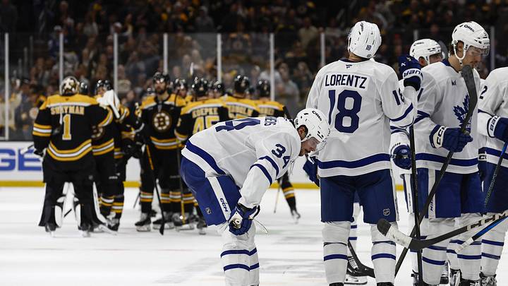Oct 26, 2024; Boston, Massachusetts, USA; Toronto Maple Leafs center Auston Matthews (34) and teammates head for the dressing room as the Boston Bruins congratulate each other after their 4-3 overtime win at TD Garden. Mandatory Credit: Winslow Townson-Imagn Images