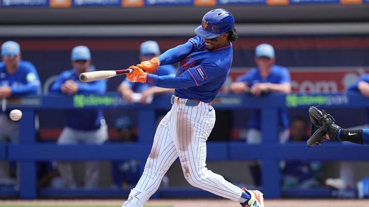 Mar 15, 2026; Port St. Lucie, Florida, USA;  New York Mets shortstop Francisco Lindor (12) hits a single in the third inning against the Toronto Blue Jays at Clover Park. Mandatory Credit: Jim Rassol-Imagn Images