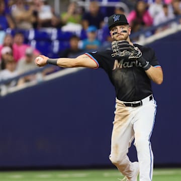 Aug 23, 2024; Miami, Florida, USA; Miami Marlins third baseman Connor Norby (24) throws to first base to retire Chicago Cubs first baseman Michael Busch (not pictured) during the seventh inning at loanDepot Park. 