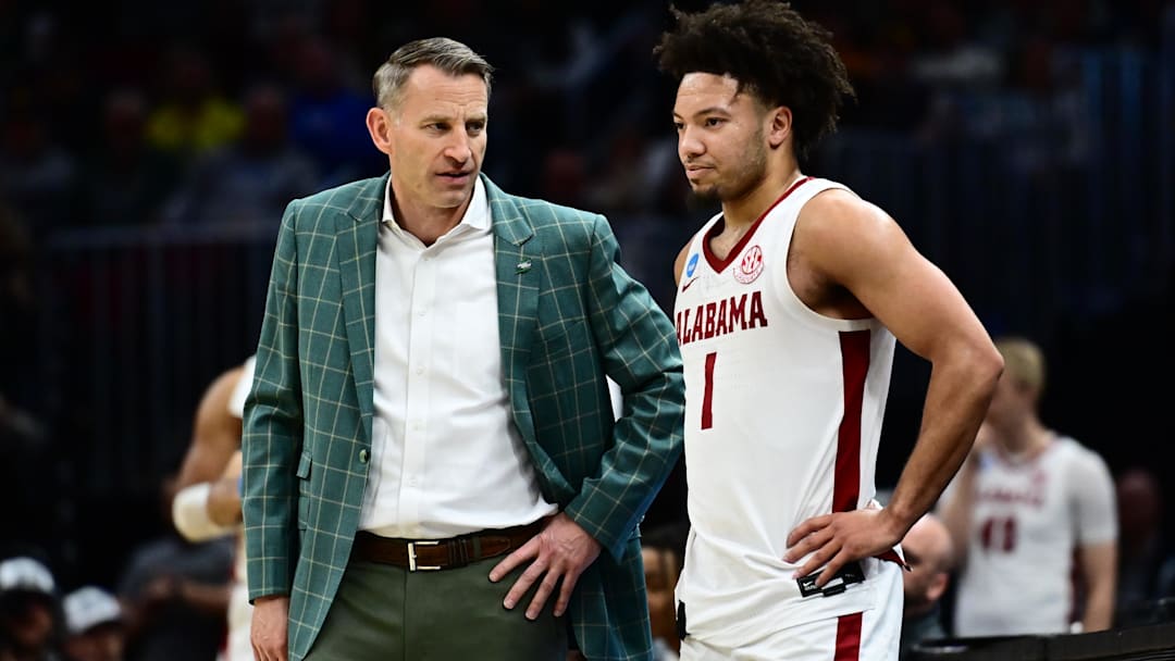 Mar 23, 2025; Cleveland, OH, USA; Alabama Crimson Tide head coach Nate Oats coaches guard Mark Sears (1) in the second half against the St. Mary's Gaels during the NCAA Tournament Second Round at Rocket Arena. Mandatory Credit: Ken Blaze-Imagn Images