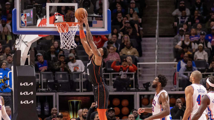 Nov 10, 2023; Detroit, Michigan, USA; Detroit Pistons guard Jared Rhoden (8) slam dunks the ball against the Philadelphia 76ers during the in the first half at Little Caesars Arena. Mandatory Credit: David Reginek-USA TODAY Sports