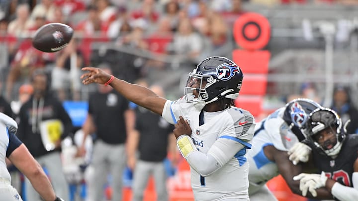 Oct 5, 2025; Glendale, Arizona, USA; Tennessee Titans quarterback Cam Ward (1) makes a throw against the Arizona Cardinals during the third quarter at State Farm Stadium. Mandatory Credit: Matt Kartozian-Imagn Images Oct 5, 2025; Glendale, Arizona, USA; Tennessee Titans quarterback Cam Ward (1) makes a throw against the Arizona Cardinals during the third quarter at State Farm Stadium. Mandatory Credit: Matt Kartozian-Imagn Images