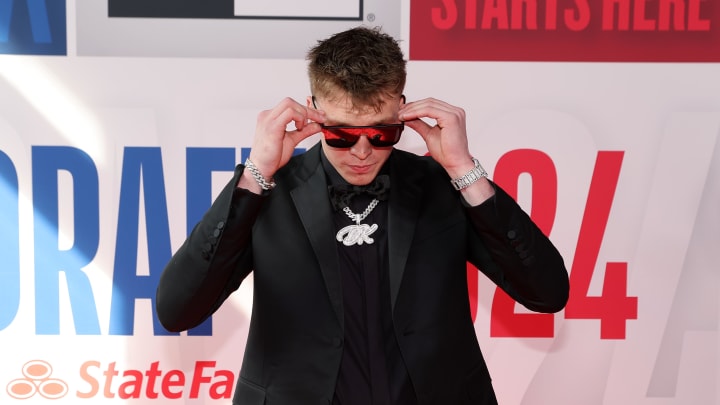 Jun 26, 2024; Brooklyn, NY, USA; Dalton Knecht arrives for the first round of the 2024 NBA Draft at Barclays Center. Mandatory Credit: Brad Penner-USA TODAY Sports