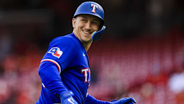 Apr 1, 2025; Cincinnati, Ohio, USA; Texas Rangers outfielder Wyatt Langford (36) reacts after hitting a solo home run in the first inning against the Cincinnati Reds at Great American Ball Park.