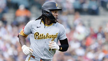 Jun 17, 2025; Detroit, Michigan, USA;  Pittsburgh Pirates outfielder Oneil Cruz (15) runs to first after hitting a single in the fourth inning against the Detroit Tigers at Comerica Park. Mandatory Credit: Rick Osentoski-Imagn Images