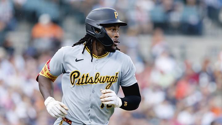 Jun 17, 2025; Detroit, Michigan, USA;  Pittsburgh Pirates outfielder Oneil Cruz (15) runs to first after hitting a single in the fourth inning against the Detroit Tigers at Comerica Park. Mandatory Credit: Rick Osentoski-Imagn Images