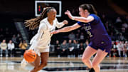 Vanderbilt Commodores guard Mikayla Blakes (1) dribbles the ball while Furman Paladins forward Clare Coyle (2) defends during the women’s basketball game between Vanderbilt vs Furman at the Memorial Gymnasium in Nashville on Monday, Nov. 10, 2025.
