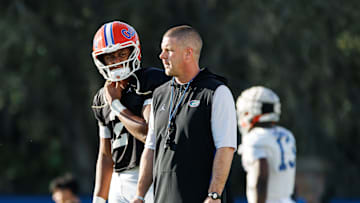 Florida Gators quarterback DJ Lagway (2) and Florida Gators head coach Billy Napier watch during spring football practice at Heavener Football Complex at the University of Florida in Gainesville, FL on Thursday, March 6, 2025. [Matt Pendleton/Gainesville Sun]