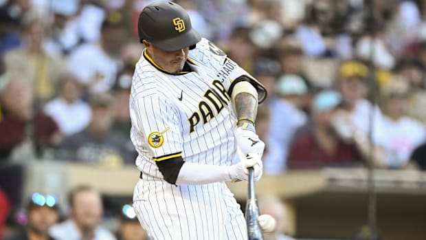 San Diego Padres third baseman Manny Machado (13) hits a single