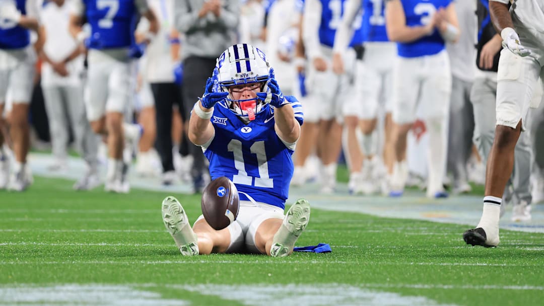Dec 27, 2025; Orlando, FL, USA; BYU Cougars wide receiver Parker Kingston (11) celebrates after a first down against the Georgia Tech Yellow Jackets during the second half at Camping World Stadium. Mandatory Credit: Kim Klement Neitzel-Imagn Images