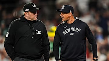 Jun 13, 2025; Boston, Massachusetts, USA; New York Yankees manager Aaron Boone (17) has words with the officials as they take on the Boston Red Sox in the tenth inning at Fenway Park. Mandatory Credit: David Butler II-Imagn Images