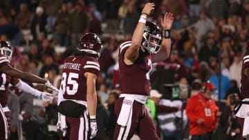 Nov 23, 2023; Starkville, Mississippi, USA; Mississippi State Bulldogs quarterback Will Rogers (2) reacts after a touchdown during the second half against the Mississippi Rebels at Davis Wade Stadium at Scott Field. Mandatory Credit: Petre Thomas-USA TODAY Sports