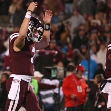 Nov 23, 2023; Starkville, Mississippi, USA; Mississippi State Bulldogs quarterback Will Rogers (2) reacts after a touchdown during the second half against the Mississippi Rebels at Davis Wade Stadium at Scott Field. Mandatory Credit: Petre Thomas-USA TODAY Sports