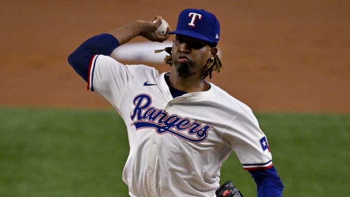 Aug 7, 2024; Arlington, Texas, USA;  Texas Rangers starting pitcher Jose Urena (54) pitches against the Houston Astros during the first inning at Globe Life Field. Mandatory Credit: Jerome Miron-USA TODAY Sports