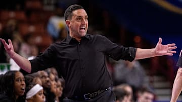 Mississippi State Bulldogs coach Sam Purcell argues for a foul during the first half against the Ole Miss Rebels at Bon Secours Wellness Arena.