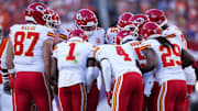Nov 16, 2025; Denver, Colorado, USA; Members of the Kansas City Chiefs offensive squad huddle in the second quarter against the Denver Broncos at Empower Field at Mile High. Mandatory Credit: Ron Chenoy-Imagn Images