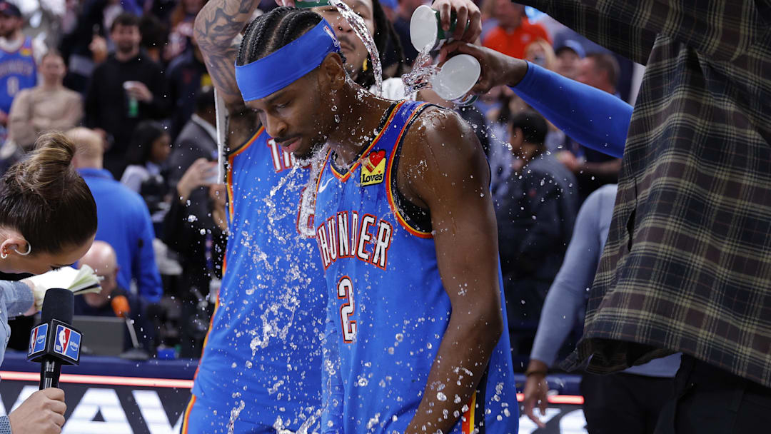Mar 12, 2026; Oklahoma City, Oklahoma, USA; Oklahoma City Thunder guard Shai Gilgeous-Alexander’s teammate pour water on him at the end of a game against the Boston Celtics during the fourth quarter at Paycom Center. Mandatory Credit: Alonzo Adams-Imagn Images