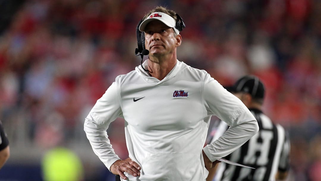 Nov 15, 2025; Oxford, Mississippi, USA; Mississippi Rebels head coach Lane Kiffin looks on during a time out during the first quarter against the Florida Gators at Vaught-Hemingway Stadium. Mandatory Credit: Petre Thomas-Imagn Images
