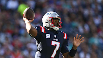 Oct 6, 2024; Foxborough, Massachusetts, USA; New England Patriots quarterback Jacoby Brissett (7) throws against the Miami Dolphins during the second half at Gillette Stadium. Mandatory Credit: Brian Fluharty-Imagn Images