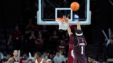 Texas A&M Aggies guard Zhuric Phelps (1) makes a 3-pointer to give Texas A&M the lead in the final seconds of an SEC men's college basketball game between the University of Oklahoma Sooners (OU) and the Texas A&M Aggies at Lloyd Noble Center in Norman, Okla., Wednesday, Jan. 8, 2025. Texas A&M won 80-78.