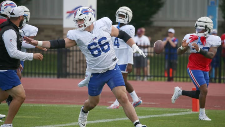 Bills offensive lineman Connor McGovern gets out on the block as the ball is pitched to running back Ray Davis in the backfield.