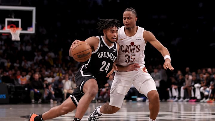 Oct 25, 2023; Brooklyn, New York, USA; Brooklyn Nets guard Cam Thomas (24) drives to the basket against Cleveland Cavaliers forward Isaac Okoro (35) during the fourth quarter at Barclays Center. Mandatory Credit: Brad Penner-Imagn Images