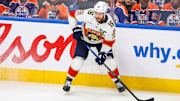 Jun 14, 2025; Edmonton, Alberta, CAN; Florida Panthers center Aleksander Barkov (16) controls the puck against the Edmonton Oilers during the second period in game five of the 2025 Stanley Cup Final at Rogers Place. Mandatory Credit: Sergei Belski-Imagn Images