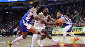 Jan 25, 2025; Chicago, Illinois, USA; Philadelphia 76ers guard Kelly Oubre Jr. (9) defends against Chicago Bulls forward Patrick Williams (44) during the first quarter at United Center. Mandatory Credit: David Banks-Imagn Images