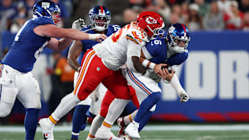 Sep 21, 2025; East Rutherford, New Jersey, USA; Kansas City Chiefs defensive tackle Omarr Norman-Lott (55) tackles New York Giants quarterback Jaxson Dart (6) in the third quarter at MetLife Stadium. Mandatory Credit: Vincent Carchietta-Imagn Images
