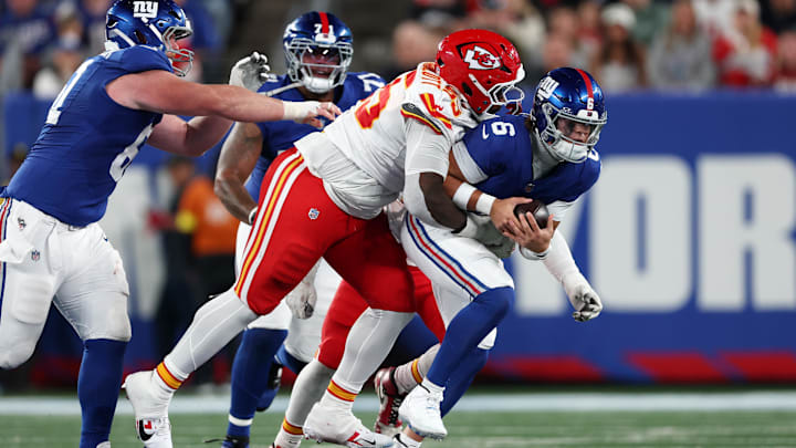 Sep 21, 2025; East Rutherford, New Jersey, USA; Kansas City Chiefs defensive tackle Omarr Norman-Lott (55) tackles New York Giants quarterback Jaxson Dart (6) in the third quarter at MetLife Stadium. Mandatory Credit: Vincent Carchietta-Imagn Images