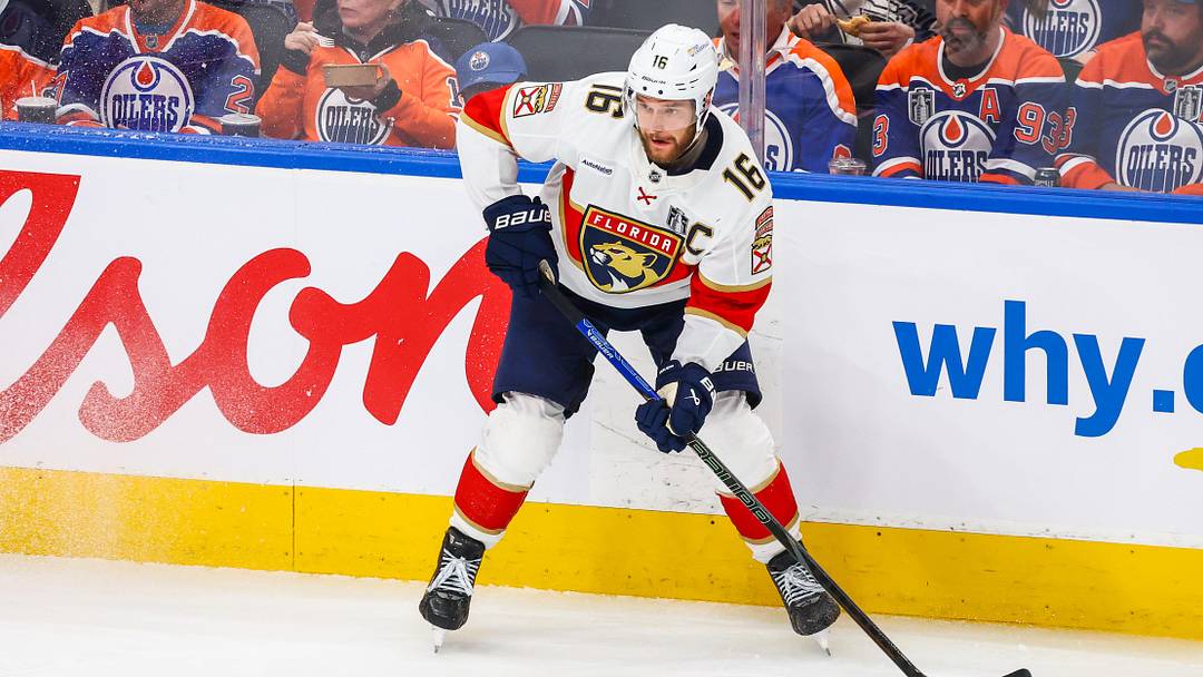 Jun 14, 2025; Edmonton, Alberta, CAN; Florida Panthers center Aleksander Barkov (16) controls the puck against the Edmonton Oilers during the second period in game five of the 2025 Stanley Cup Final at Rogers Place. Mandatory Credit: Sergei Belski-Imagn Images