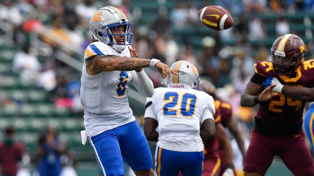 Albany State quarterback Isaiah Knowles (6) throws during a game against Central State