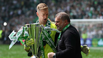 Joe Hart and Ange celebrate one of many trophies they won together 