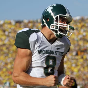 Oct. 9, 2010: Michigan State 34, Michigan 17, Michigan Stadium: MSU quarterback Kirk Cousins celebrates a Spartans touchdown.

Msufeat 100910 Rr34