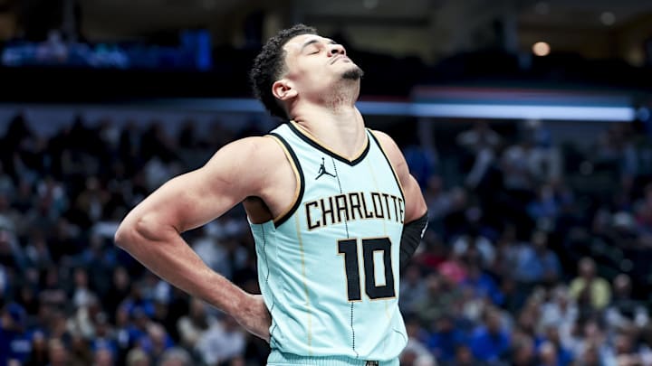 Feb 27, 2025; Dallas, Texas, USA;  Charlotte Hornets guard Josh Green (10) reacts against the Dallas Mavericks during the second half at American Airlines Center. Mandatory Credit: Kevin Jairaj-Imagn Images